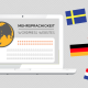 Laptop mit Website, daneben mehrere Länderflaggen